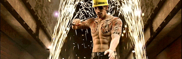 gif of goro majima entering a fighting ring with sparks flying behind him